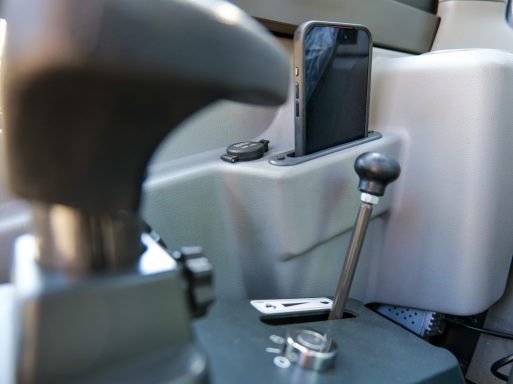 SDLG ER627H mini excavator cab view of throttle and mobile phone holder